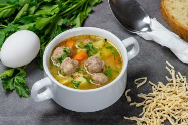 Hearty Vegetable and Meatball Soup with Homemade Dumplings