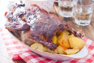 Oven-Baked Duck with Stuffed Potatoes