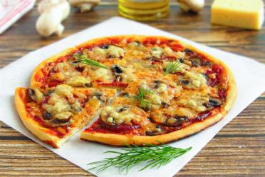 Oven-Baked Mushroom, Sausage, and Cheese Pizza