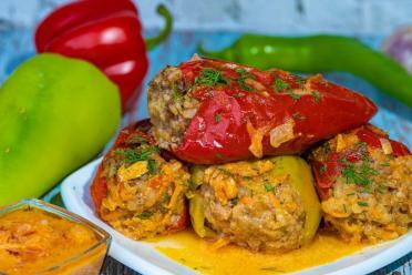 Oven-Baked Stuffed Peppers in Tomato-Sour Cream Sauce