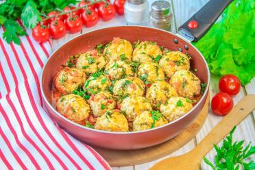 Juicy Tomato Rice Meatballs in a Skillet