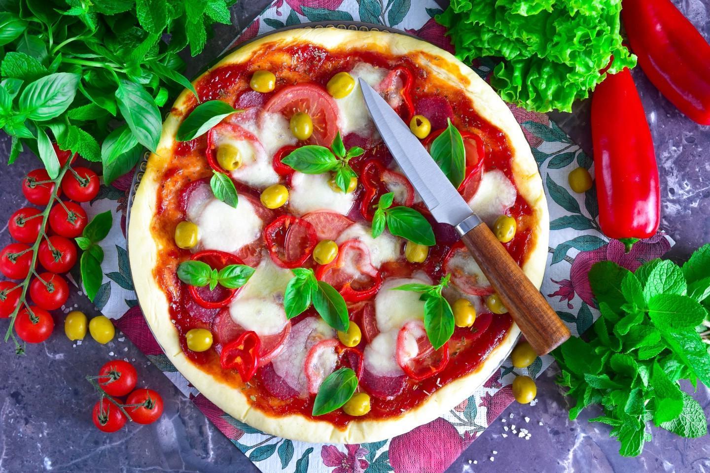 Perfect Pizzeria-Style Thin Crust Pizza at Home