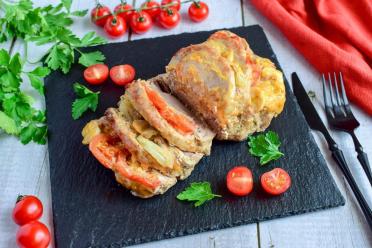 Oven-Baked Pork with Cheese and Tomatoes in Foil