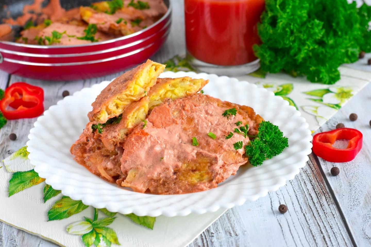 Fried Cabbage Pancakes in Tomato and Sour Cream Sauce