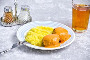"Hearty Soviet-Style Cutlets in Gravy"