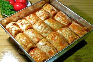 Baked Stuffed Cabbage Rolls in Tomato Sauce