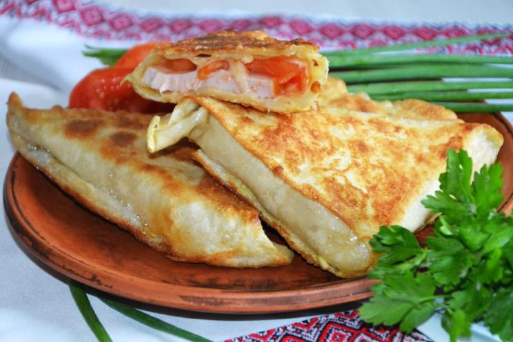 Cheesy Sausage-Stuffed Lavash Triangles