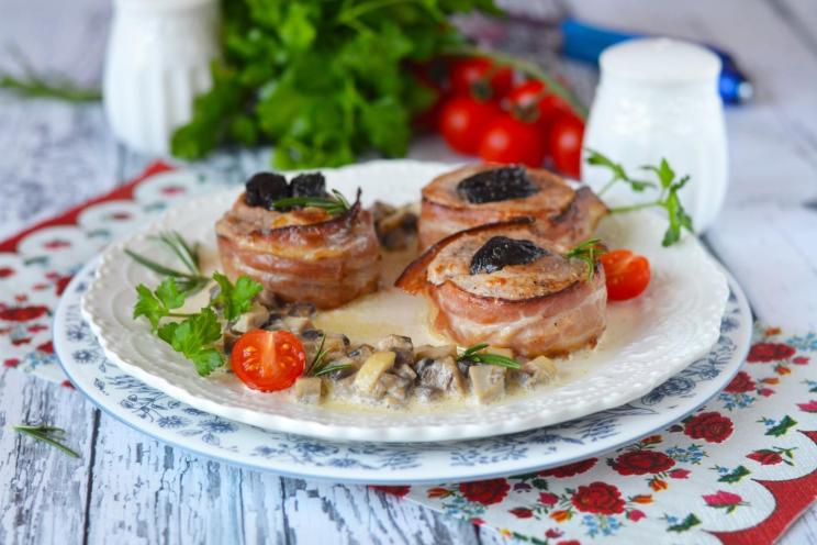 Bacon-Wrapped Pork Tenderloin with Prunes & Creamy Mushroom Sauce