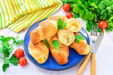 Cheesy Oven-Baked Yeast Dough Pies