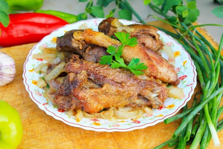 Smoky Fire-Cooked Duck with Onions Smoky Fire-Cooked Duck with Onions
