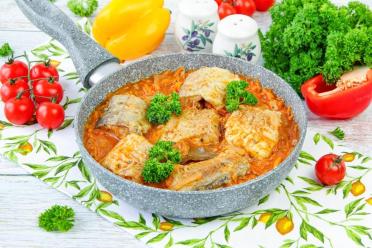 Sautéed Pollock with Carrots and Onions in Tomato Sauce