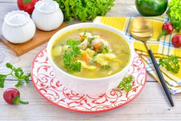 Comforting Chicken Soup with Sunny Dumplings
